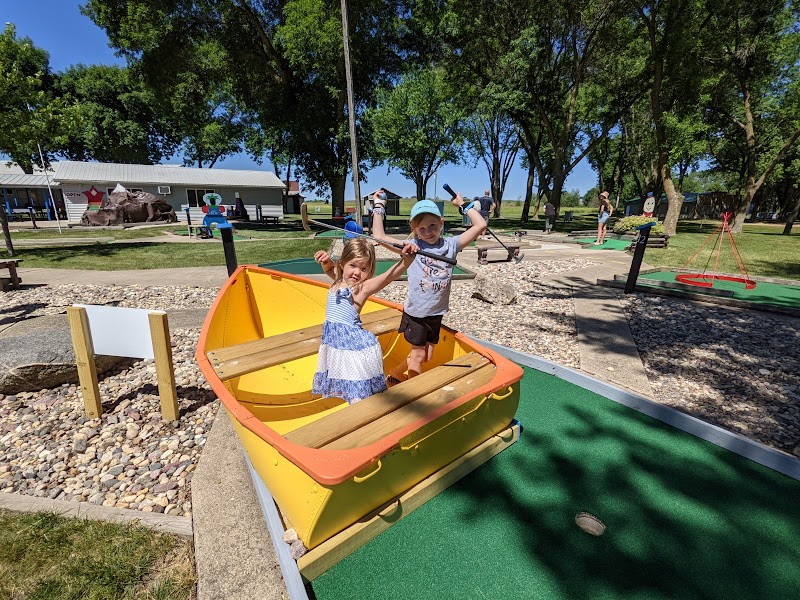 Treasure Village Mini Golf banner