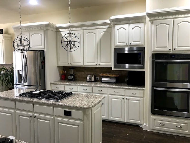 Freshly painted white kitchen cabinets