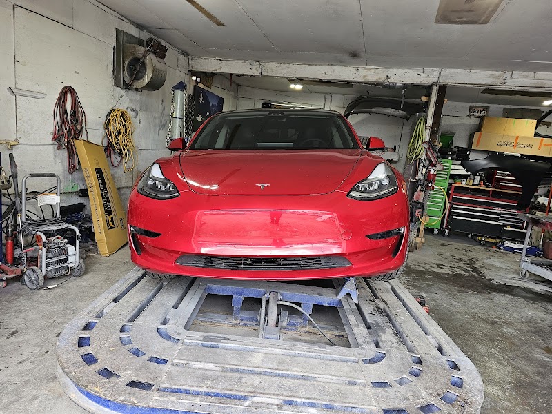 Detailed dent removal on sedan side panel