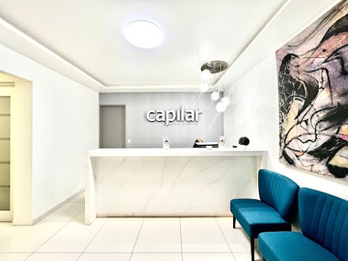 Capilar Hair Center by Dr. Jorge Jimmy Cortez logo