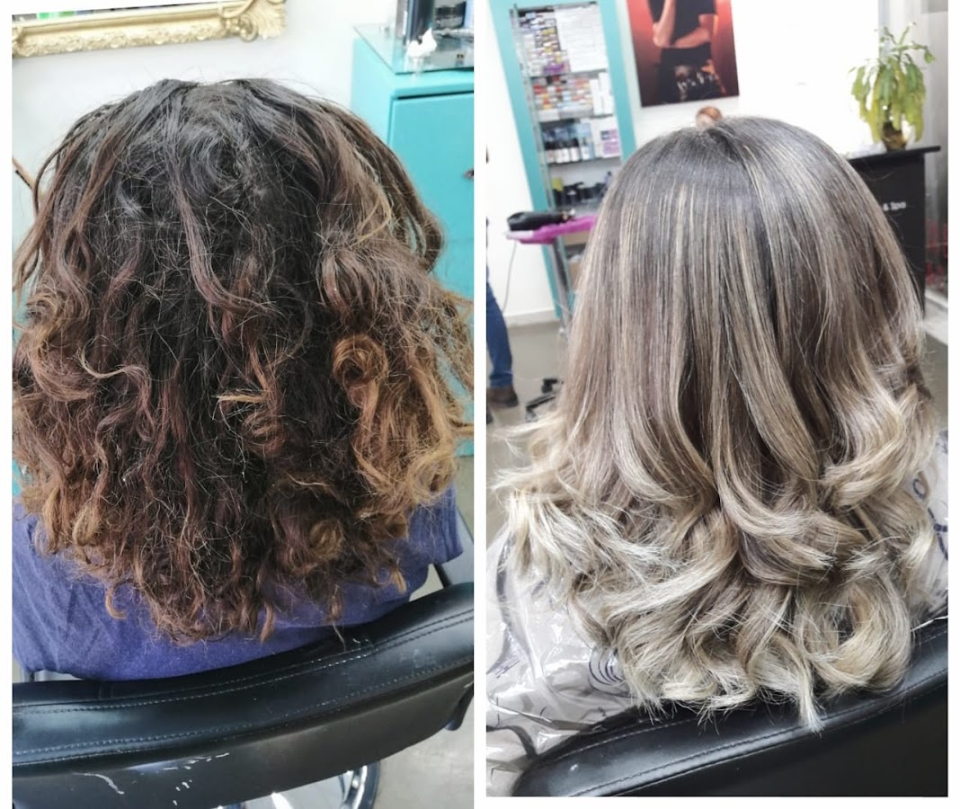 Estación de trabajo en Blick Peluquería con tijeras y espejo