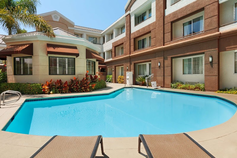 Outdoor Pool and Fitness Room