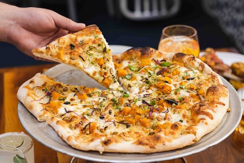 Wood-fired pizzas with a light, chewy crust