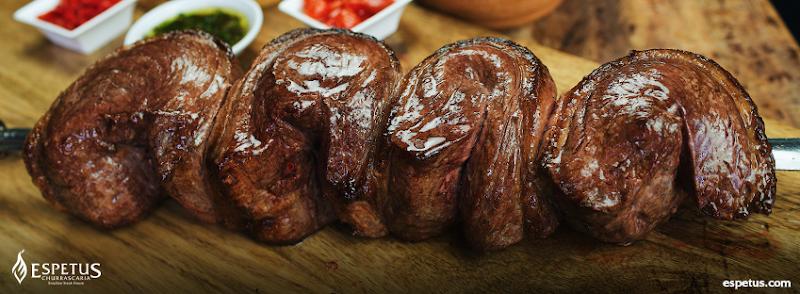Continuous tableside carving of 14 signature meats